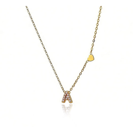 Collar inicial con circonitas y corazón de acero inoxidable dorado - Keoki Shop