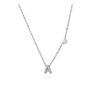 Collar inicial con circonitas y corazón de acero inoxidable plateado - Keoki Shop